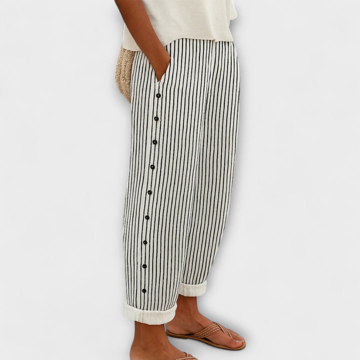 REA – Pantalones deportivos a rayas y relajados