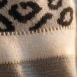 MARTINA – JERSEY LEOPARDO ELEGANTE CON CUELLO ALTO