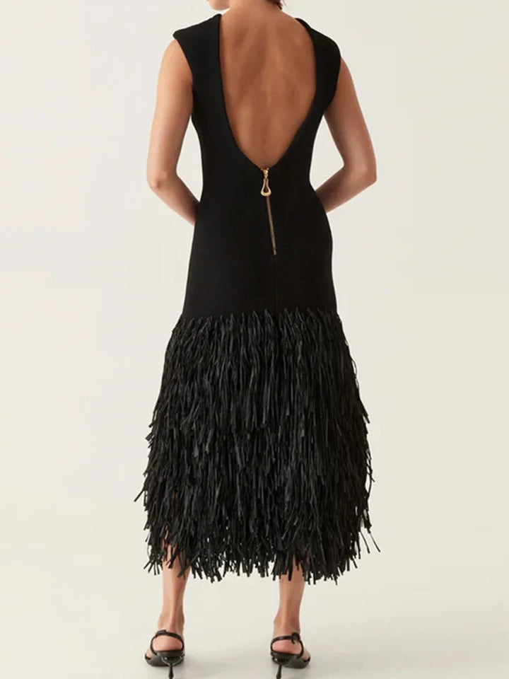 AMIRA – Vestido largo con flecos