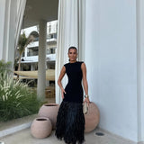 AMIRA – Vestido largo con flecos