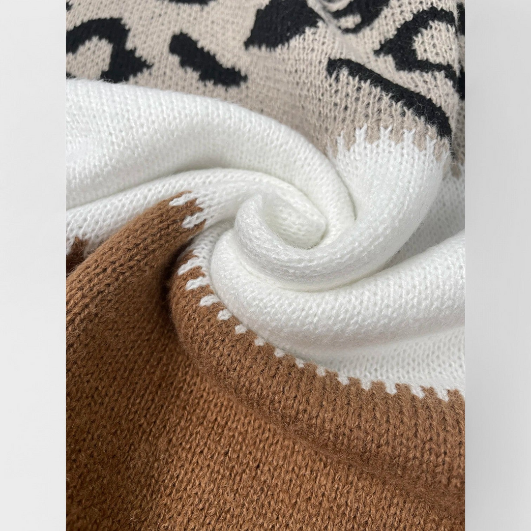 MARTINA – JERSEY LEOPARDO ELEGANTE CON CUELLO ALTO